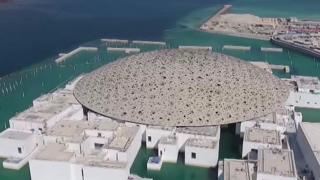 The billion-dollar Louvre museum shimmering in the Abu Dhabi desert