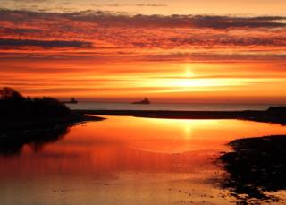 Taken from the Bridge of Don looking out of the mouth of the river out to sea.