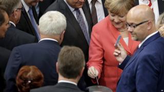 German Chancellor Angela Merkel votes in parliament. 17 July 2015