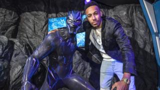 Pierre-Emerick Aubameyang unveiling the new Black Panther wax figure