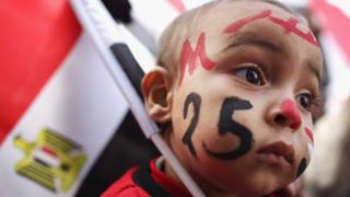 طفل مشارك في المظاهرات