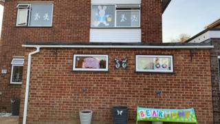 Residents in Buntingford, Hertfordshire, decorate their homes for a children's bear hunt