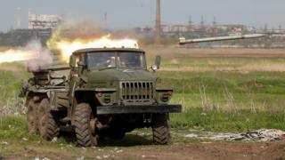 Service members of pro-Russian troops fire a BM-21 Grad multiple rocket launch system during fighting in Ukraine-Russia conflict near a plant of Azovstal Iron and Steel Works in the southern port city of Mariupol, Ukraine 2 May 2022