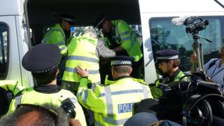 One of the men arrested during the climate protest