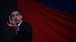 Venezuela's opposition leader Juan Guaidó addresses opposition lawmakers in Caracas on 15 January