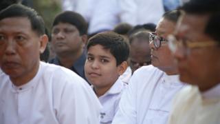 One of the King’s Indian great-great-great grandsons looks on at the memorial ceremony