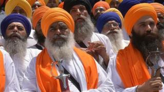 Dhian Singh Mand (C), Amrik Singh Ajnala (L), and Baljit Singh Daduwal (R)