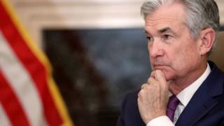 Federal Reserve warns of continuing need to protect US economy