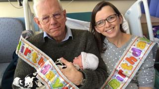 Philip Hutchinson, his grandson Logan, and his daughter, Catherine McLatchie