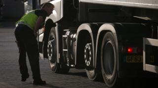   Border Force personnel check trucks and trucks arriving at the British border as they leave a transcbad ferry from France 