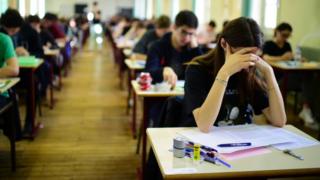 Teenagers taking an exam, file pic, 24 Jun 15