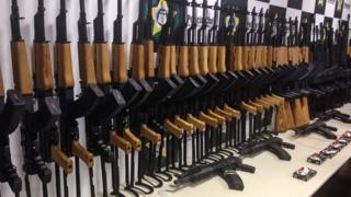 Handout image released by Brazilian Civil Police showing 60 firearms seized from inside shipments of pool heating systems from Miami on June 1, 2017
