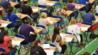 teenagers sitting GCSE exams