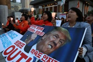 Activists gather in front of the U.S. embassy to demand peace for the Korean peninsula after the cancellation of the U.S. and North Korea summit on May 25, 2018 in Seoul, South Korea.