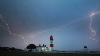 Lightning flashes over Souter lighthouse in Sunderland