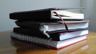 Pila de cuadernos