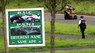Banner in estate saying RUC PSNI Different name same aim