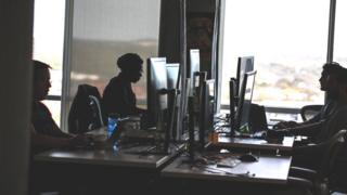 Facebook moderators working at its offices in Austin, Texas