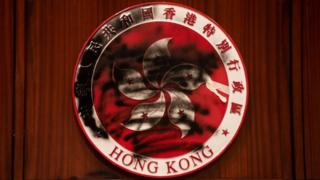 Hong Kong emblem defaced by a graffiti during the demonstration At Legco