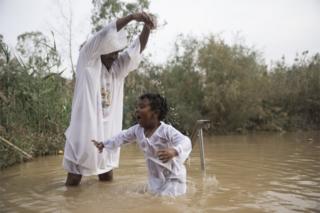 Ethiopian pilgrims travel to the Qasr al-Yahud Baptismal Site in the Jordan, West Bank near Jericho, on November 29, 2018.