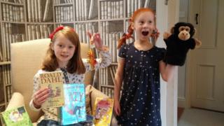 Here are Saskia and Isla as Matilda and Pippi Longstocking with Mr Nelson, Pippi's pet monkey. The sisters are from Portishead in England.