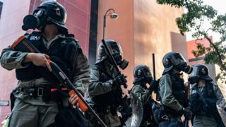 SEPTEMBER 21: Riot police stand guard on a street during a clash with protesters after an anti-government rally in Tuen Mun district on September 21, 2019 in Hong Kong, China.