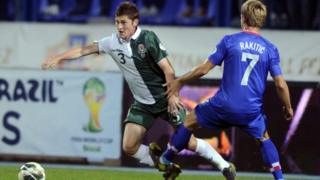 Ben Davies ac Ivan Rakitic