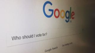 A Google search box with the question "Who should I vote for?"
