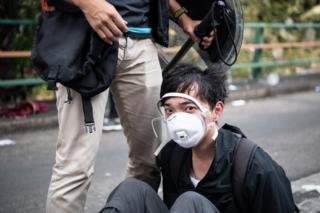 HONG KONG, CHINA - NOVEMBER 18: Police arrest anti-government protesters at Hong Kong Polytechnic University on November 18, 2019 in Hong Kong, China. Anti-government protesters armed with bricks, firebombs, and bows and arrows fought with the police at university campuses over the weekend as demonstrations in Hong Kong stretched into its sixth month with demands for an independent inquiry into police brutality, the retraction of the word "riot" to describe the rallies, and genuine universal suffrage. (Photo by Laurel Chor/Getty Images)