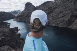 Mina Guli looks out at the Colorado River at the Arizona Hot Springs