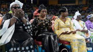 Supporters of outgoing President of Mali Ibrahim Boubacar Keita attend a meeting as he is campaigning along with the Malian diaspora in Libreville, on July 23, 2018