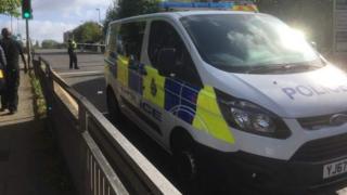 Police van at the scene in Burmantofts Street