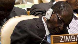 President Mugabe slouches in chair with eyes closed at the UN General Assembly