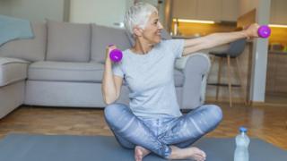 woman doing weights