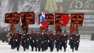Honour guards carry the banners of the Soviet Fronts that fought for Leningrad during World War Two. Photo: 27 January 2019