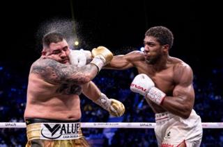 Anthony Joshua punches Andy Ruiz Jr during their world heavyweight title fight at the Diriyah Arena, Saudi Arabia, on 7 December 2019
