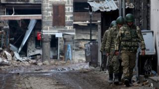 Turkish soldiers patrol in Sur district, which is partially under curfew, in the Kurdish-dominated south-eastern city of Diyarbakir, Turkey February 26, 2016. REUTERS/Sertac Kayar