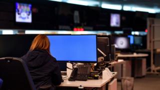 Woman at a screen at GCHQ (file pic)