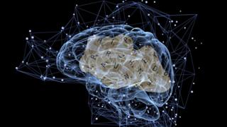 An image of a human brain with scrabble letters inside it