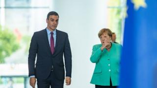 German Chancellor Angela Merkel and Spanish Prime Minister Pedro Sanchez arrive for a joint press statement