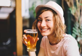 Woman with a beer