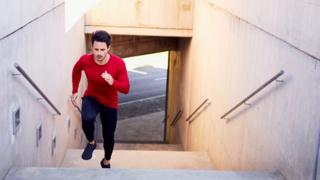 A man climbing the stairs