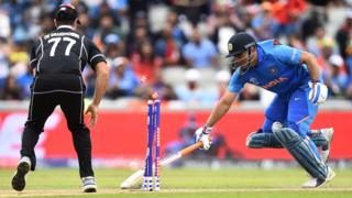 MS Dhoni is run out in the Cricket World Cup semi-final between India and New Zealand