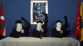 Three members of Basque separatist group ETA sit masked in a still image taken from a video published on the website of Basque language newspaper Gara on October 20, 2011.