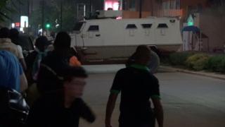 An armoured vehicle opens fire in the direction of a restaurant following an attack by gunmen in Ouagadougou, Burkina Faso