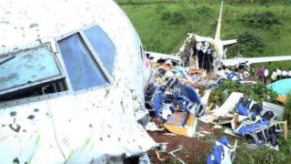 The wreckage of an Air India Express plane in Kerala