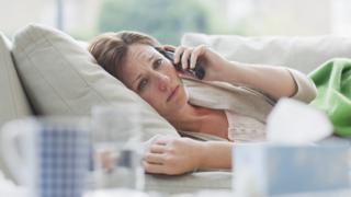 Generic picture of woman at home on a sick day