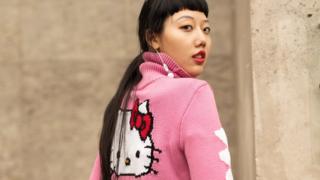 Paris fashion week model wearing Hello Kitty jumper