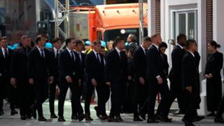 Leicester City players arrive at the funeral of Thai businessman Vichai Srivaddhanaprabha in Bangkok,