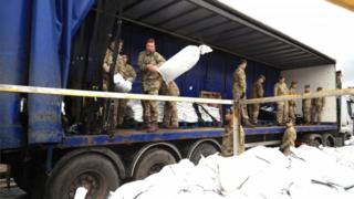 Soldiers from the Highlanders, 4th Battalion, the Royal Regiment of Scotland in Mytholmroyd to assist with flood defences,